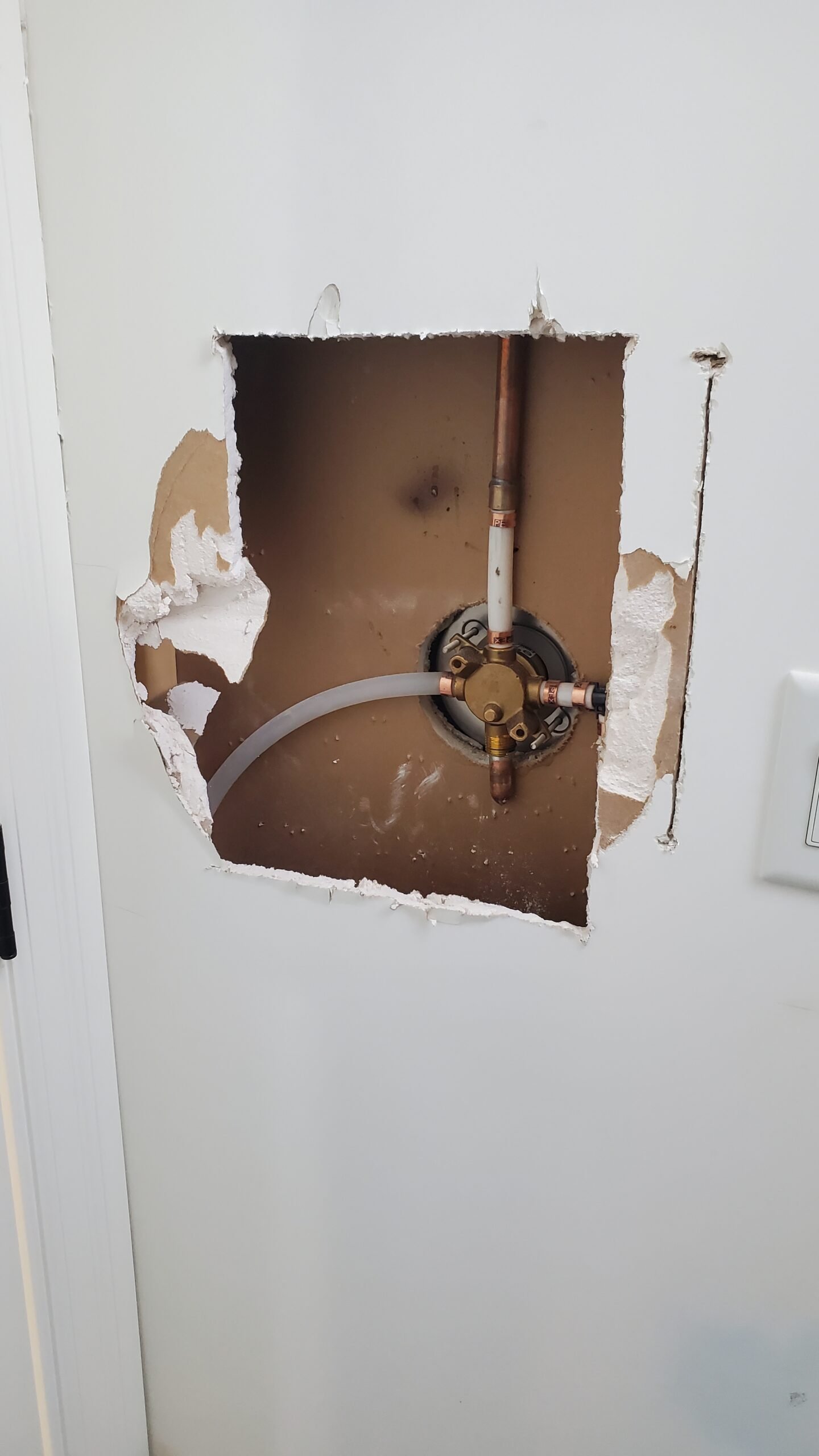 Plumber made a hole on wall